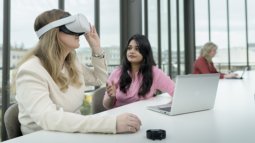 Health Sciences students conduct research using a VR headset and smartwatch.