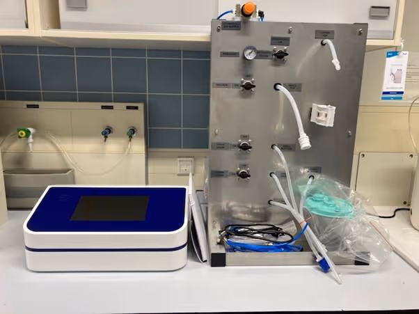 A machine with pipes and tubesAI-generated content may be incorrect.