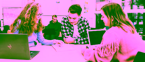 Applied Mathematics students discussing their group project