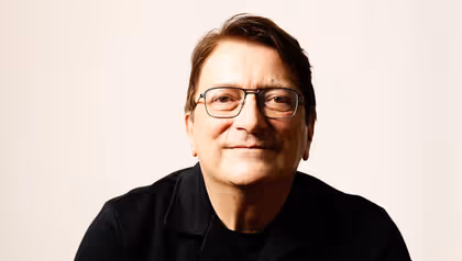 Man with glasses and brown hair