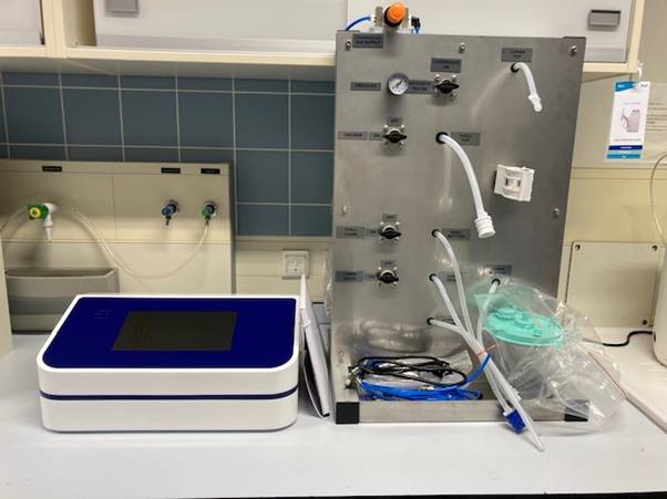 A machine with pipes and tubesAI-generated content may be incorrect.