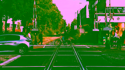 Person riding a bicycle on streets of Enschede