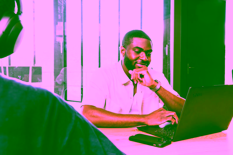 A student working on his laptop.