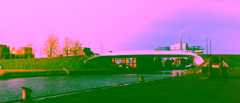 Modern bridge crossing a canal, illustrating structural design and transport integration in civil engineering