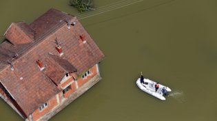 Flooded house Shutterstock_551026606