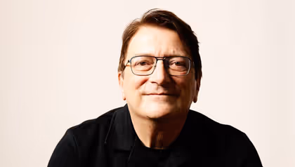 Man with glasses and brown hair