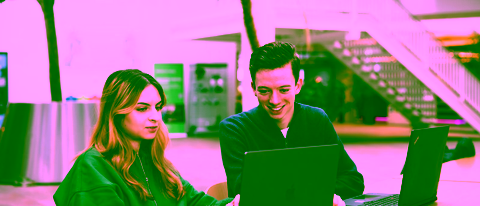 Two students of Business Information Technology at the University of Twente work together on a project.