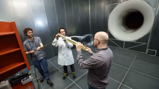 Wind tunnel test with smoke visualization, demonstrating aerodynamic analysis and experimental methods in mechanical engineering.