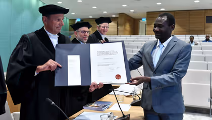 Calisto Omondi receives PhD title