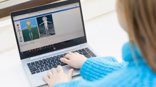 Laptop screen with educational images