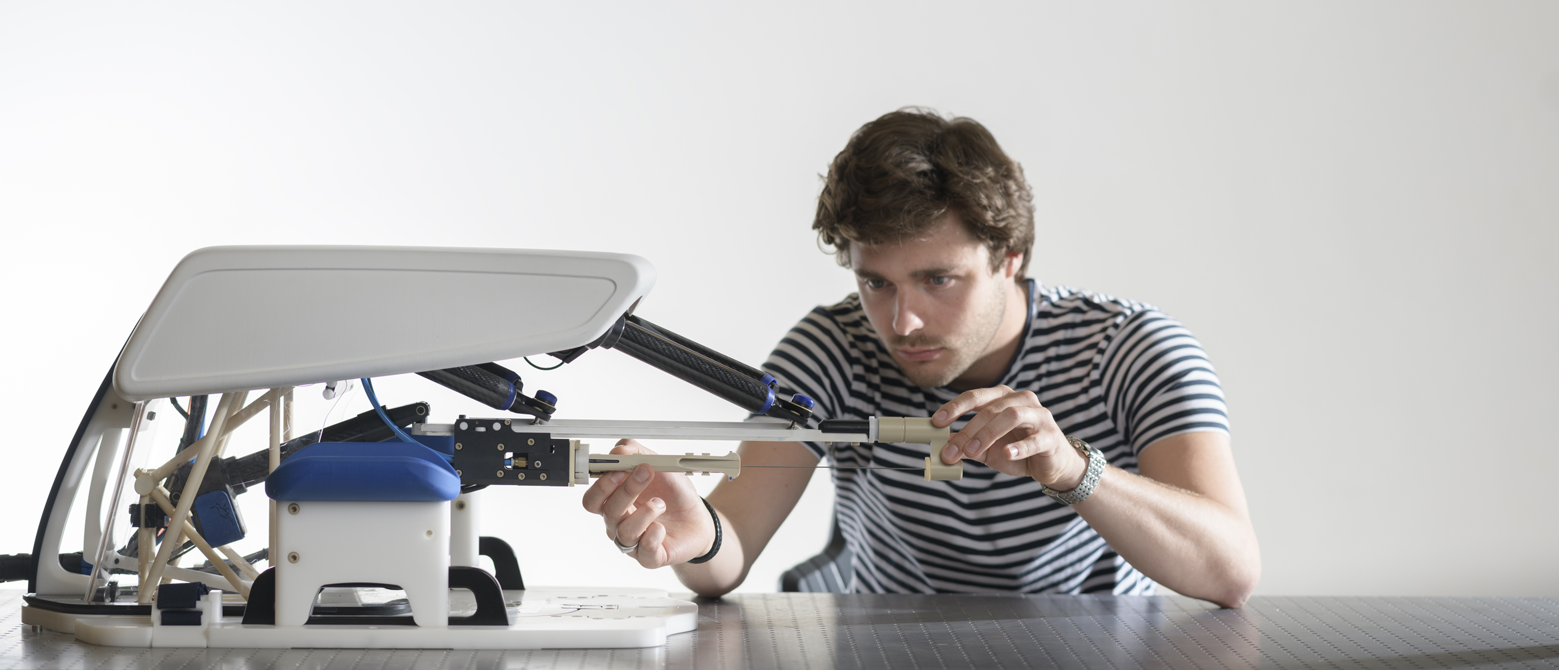 Biomedical Engineering student working on the development of a medical device.